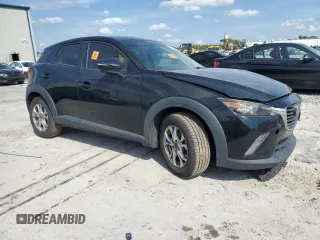 2016 Mazda CX-3 Touring with VIN JM1DKBC7XG0121516, listed as a Copart auction lot 48632965 with 119,449 mi miles and Salvage Title. Bid and sale history available at carsss.com. Image 4.