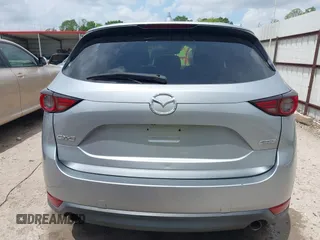 2018 Mazda CX-5 Grand Touring with VIN JM3KFADM6J0339185, listed as a IAAI auction lot 42160763 with 86,312 mi miles and . Bid and sale history available at DreamBid. Image 16.