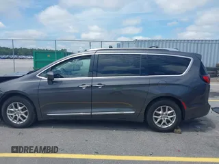 2020 Chrysler Pacifica Touring L with VIN 2C4RC1BG1LR269004, listed as a IAAI auction lot 42287228 with 71,498 mi miles and . Bid and sale history available at DreamBid. Image 14.
