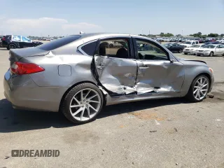 2013 Infiniti M with VIN JN1BY1AP2DM511973, listed as a Copart auction lot 55351815 with 126,888 mi miles and Salvage title. Bid and sale history available at DreamBid. Image 3.