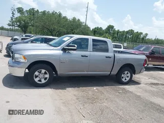 2023 Ram 1500 SLT z VIN 1C6RR7LG0PS517769, wystawiony jako IAAI lot #42451307 z przebiegiem 49 931 mil mil oraz . Historia ofert i sprzedaży dostępna na DreamBid. Obrazek 14.