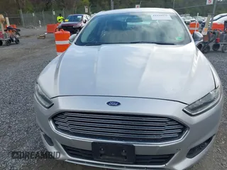 2015 Ford Fusion SE with VIN 3FA6P0HDXFR307381, listed as a IAAI auction lot 41928936 with 154,504 mi miles. Bid and sale history available at carsss.com. Image 6.