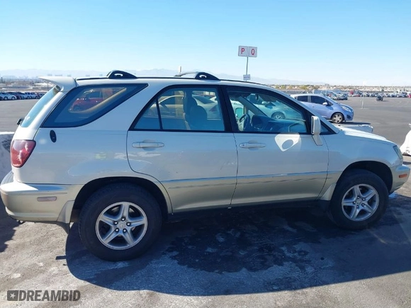 1999 Lexus RX 300 Luxury SUV with VIN JT6GF10U9X0015877, listed as a IAAI auction lot 41666610 with NaN miles. Bid and sale history available at carsss.com. Image 12.