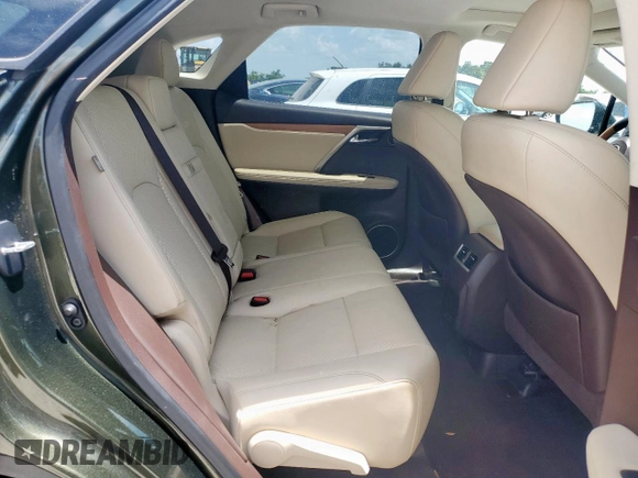2020 Lexus RX 450h with VIN 2T2HGMDA3LC046646, listed as a Copart auction lot 61030015 with 74,709 mi miles and Salvage title. Bid and sale history available at DreamBid. Image 11.