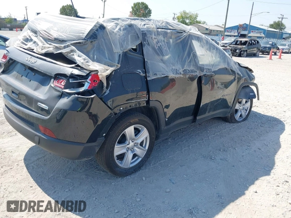 2022 Jeep Compass Latitude with VIN 3C4NJCBB7NT229059, listed as a IAAI auction lot 40291334 with 5,693 mi miles and . Bid and sale history available at carsss.com. Image 4.