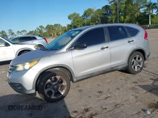 2014 Honda CR-V LX with VIN 3CZRM3H35EG708060, listed as a IAAI auction lot 41761003 with 142,954 mi miles. Bid and sale history available at carsss.com. Image 17.