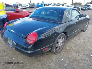 2004 Ford Thunderbird Deluxe with VIN 1FAHP60A64Y101843, listed as a IAAI auction lot 41582696 with 146,492 mi miles and . Bid and sale history available at DreamBid. Image 4.