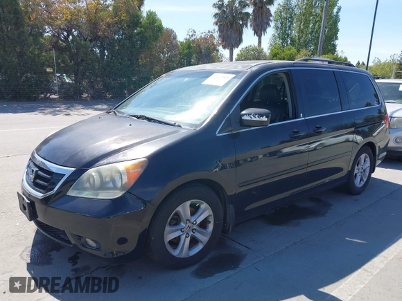2008 Honda Odyssey Touring with VIN 5FNRL38948B116432, listed as a IAAI auction lot 42162566 with 121,996 mi miles. Bid and sale history available at carsss.com. Image 2.