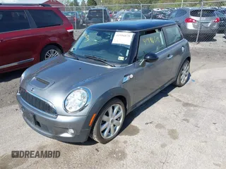 2007 MINI Hardtop S with VIN WMWMF73587TT84728, listed as a IAAI auction lot 41996879 with 145,094 mi miles and . Bid and sale history available at DreamBid. Image 2.