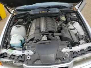 1998 BMW 3 Series 323i with VIN WBABJ8332WEM22760, listed as a Copart auction lot 59631805 with 77,300 mi miles and Salvage title. Bid and sale history available at DreamBid. Image 11.