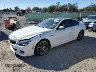 2016 BMW 6 Series z VIN WBA6H1C50GD932912, wystawiony jako Copart lot #84513754 z przebiegiem 137 855 mil mil oraz Czysty tytuł • Clean title. Historia ofert i sprzedaży dostępna na DreamBid. Obrazek 1.