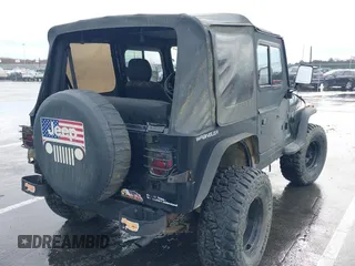 1995 Jeep Wrangler S with VIN 1J4FY19P0SP258399, listed as a IAAI auction lot 41970320 with 151,621 mi miles. Bid and sale history available at carsss.com. Image 4.
