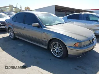 2002 BMW 5 Series 530iA with VIN WBADT63462CH87855, listed as a IAAI auction lot 41988011 with Not Provided miles. Bid and sale history available at carsss.com. Image 1.