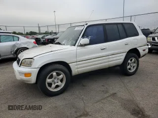 1999 Toyota RAV4 z VIN JT3HP10V2X7132831, wystawiony jako Copart lot #61091055 z przebiegiem 236 788 mil mil oraz Czysty tytuł • Clean title. Historia ofert i sprzedaży dostępna na DreamBid. Obrazek 1.