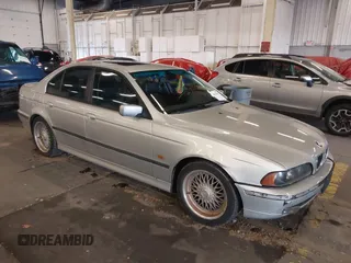 2000 BMW 5 Series 528iA with VIN WBADM6343YGU29947, listed as a IAAI auction lot 40979995 with 191,475 mi miles. Bid and sale history available at carsss.com. Image 1.