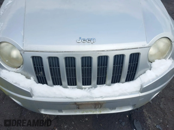2007 Jeep Compass Sport with VIN 1J8FF47W17D142461, listed as a IAAI auction lot 41629674 with 153,516 mi miles. Bid and sale history available at carsss.com. Image 6.