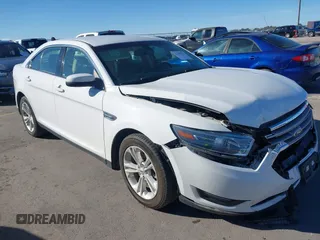 2015 Ford Taurus SEL with VIN 1FAHP2E8XFG182899, listed as a IAAI auction lot 41209454 with 93,477 mi miles and . Bid and sale history available at carsss.com. Image 1.