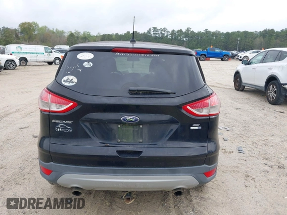2016 Ford Escape SE with VIN 1FMCU9G99GUC13053, listed as a IAAI auction lot 41888535 with 84,019 mi miles. Bid and sale history available at carsss.com. Image 16.