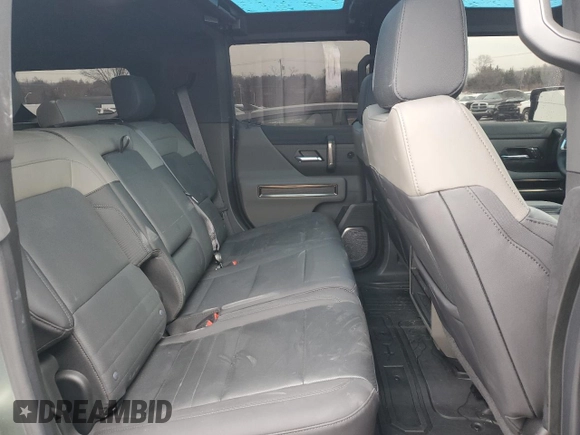 2024 GMC Hummer EV 3X z VIN 1GKB0RDC6RU101989, wystawiony jako Copart lot #85671314 z przebiegiem 7434 mil mil oraz Szkody całkowita. Historia ofert i sprzedaży dostępna na DreamBid. Obrazek 11.