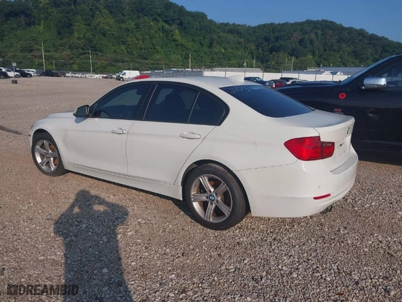 2014 BMW 3 Series 328i xDrive with VIN WBA3B5C51EP542103, listed as a IAAI auction lot 40113663 with 160,776 mi miles. Bid and sale history available at carsss.com. Image 3.