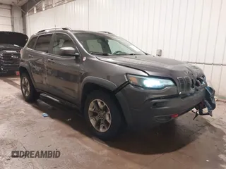 2019 Jeep Cherokee Trailhawk Elite with VIN 1C4PJMBX8KD298807, listed as a IAAI auction lot 41107062 with 79,685 mi miles. Bid and sale history available at carsss.com. Image 1.