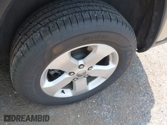 2011 Jeep Grand Cherokee Laredo with VIN 1J4RR4GG0BC713919, listed as a IAAI auction lot 42425229 with 139,379 mi miles and . Bid and sale history available at DreamBid. Image 12.
