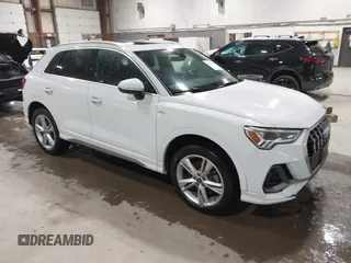 2021 Audi Q3 S line Premium Plus with VIN WA1EECF31M1060356, listed as a IAAI auction lot 42242850 with 83,380 mi miles and . Bid and sale history available at DreamBid. Image 1.