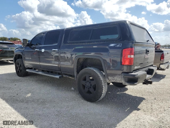 2015 GMC Sierra 2500HD Denali with VIN 1GT120EG3FF663024, listed as a Copart auction lot 79042604 with 189,284 mi miles and Salvage Title. Bid and sale history available at carsss.com. Image 2.
