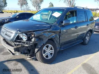 2003 Honda Pilot EX with VIN 2HKYF18633H599550, listed as a IAAI auction lot 41813549 with 242,103 mi miles. Bid and sale history available at carsss.com. Image 2.