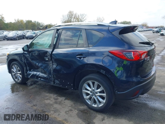 2015 Mazda CX-5 Grand Touring with VIN JM3KE4DY7F0478823, listed as a IAAI auction lot 40731626 with 82,884 mi miles. Bid and sale history available at carsss.com. Image 14.