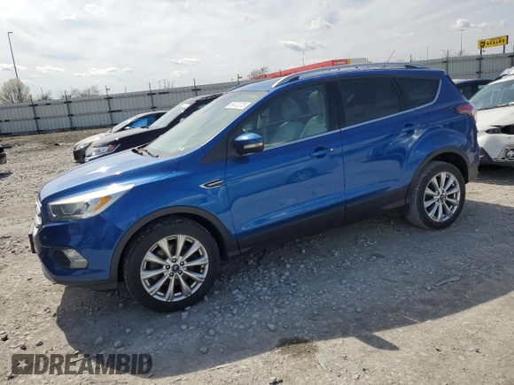 2017 Ford Escape Titanium with VIN 1FMCU9J9XHUA93760, listed as a Copart auction lot 50472375 with 104,247 mi miles and Salvage Title. Bid and sale history available at carsss.com. Image 1.