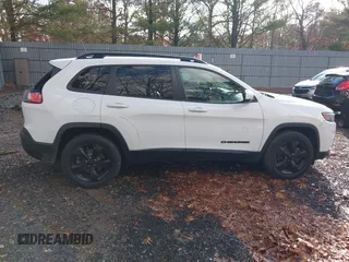 2019 Jeep Cherokee Latitude Plus with VIN 1C4PJMLB4KD321809, listed as a IAAI auction lot 40982234 with 132,496 mi miles. Bid and sale history available at carsss.com. Image 13.