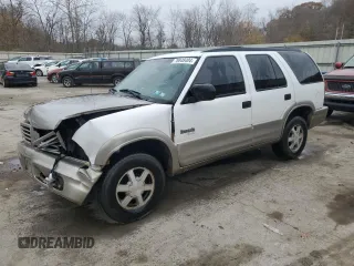 1999 Oldsmobile Bravada z VIN 1GHDT13W6X2718787, wystawiony jako Copart lot #78848404 z przebiegiem 229 665 mil mil oraz Szkody całkowita. Historia ofert i sprzedaży dostępna na DreamBid. Obrazek 1.