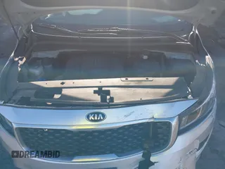 2016 Kia Sedona LX with VIN KNDMB5C18G6164472, listed as a IAAI auction lot 41661530 with 116,904 mi miles. Bid and sale history available at carsss.com. Image 10.