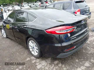 2020 Ford Fusion SE z VIN 3FA6P0HD5LR178607, wystawiony jako IAAI lot #42094774 z przebiegiem 123 341 mil mil oraz . Historia ofert i sprzedaży dostępna na DreamBid. Obrazek 3.