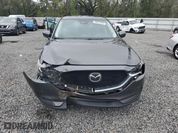 2020 Mazda CX-5 Grand Touring with VIN JM3KFADM6L0839527, listed as a Copart auction lot 46677475 with 50,305 mi miles and Salvage Title. Bid and sale history available at DreamBid. Image 5.