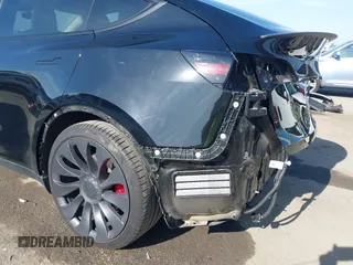 2021 Tesla Model Y Performance with VIN 5YJYGDEF1MF092889, listed as a IAAI auction lot 42076715 with 48,373 mi miles and . Bid and sale history available at DreamBid. Image 19.