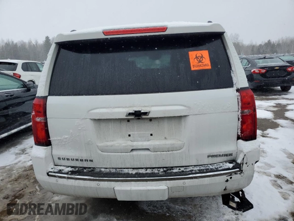 2019 Chevrolet Suburban Premier with VIN 1GNSKJKC8KR386432, listed as a Copart auction lot 46705655 with 79,814 mi miles and Salvage Title. Bid and sale history available at DreamBid. Image 6.