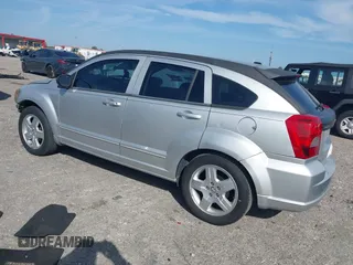 2009 Dodge Caliber SXT with VIN 1B3HB48A39D142674, listed as a IAAI auction lot 41642867 with 156,504 mi miles and . Bid and sale history available at carsss.com. Image 3.