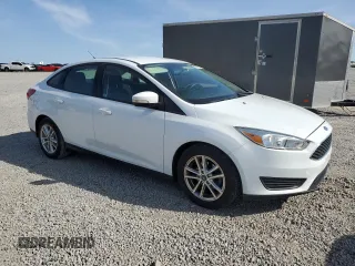 2017 Ford Focus SE z VIN 1FADP3F22HL312683, wystawiony jako Copart lot #53385315 z przebiegiem 88 751 mil mil oraz Szkoda całkowita • Salvage title. Historia ofert i sprzedaży dostępna na DreamBid. Obrazek 4.