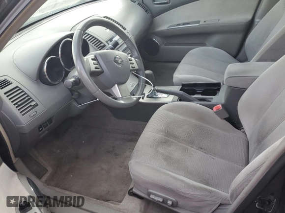 2005 Nissan Altima SL with VIN 1N4BL11D85C394186, listed as a Copart auction lot 80454614 with 176,406 mi miles and Salvage title. Bid and sale history available at DreamBid. Image 7.