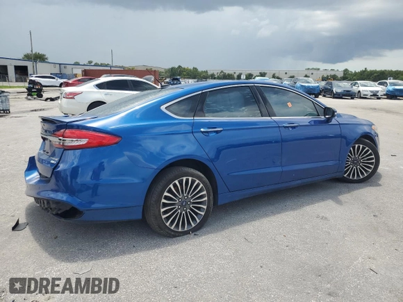 2018 Ford Fusion Titanium with VIN 3FA6P0D97JR219690, listed as a Copart auction lot 63773595 with 138,066 mi miles and Salvage title. Bid and sale history available at DreamBid. Image 3.