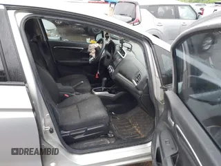 2016 Honda Fit EX with VIN JHMGK5H77GX022973, listed as a IAAI auction lot 42087380 with 96,439 mi miles and . Bid and sale history available at DreamBid. Image 5.