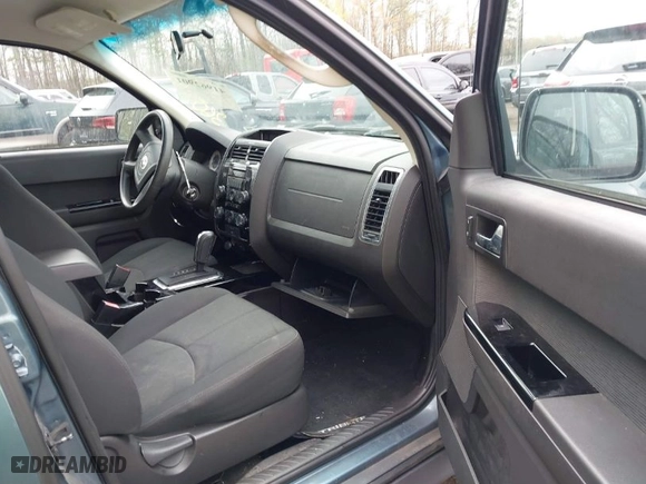 2010 Mazda Tribute Sport with VIN 4F2CY9C79AKM01295, listed as a IAAI auction lot 41962901 with 183,002 mi miles. Bid and sale history available at carsss.com. Image 5.