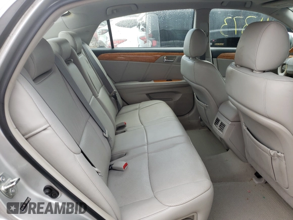 2005 Toyota Avalon XL z VIN 4T1BK36B95U044040, wystawiony jako Copart lot #59369691 z przebiegiem 111 373 mil mil oraz Szkoda całkowita • Salvage title. Historia ofert i sprzedaży dostępna na DreamBid. Obrazek 6.