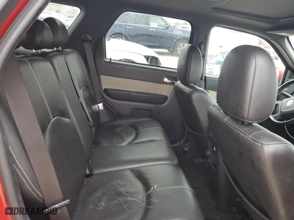 2009 Mercury Mariner Premier with VIN 4M2CU87G59KJ26384, listed as a Copart auction lot 42447775 with 115,695 mi miles and Salvage Title. Bid and sale history available at carsss.com. Image 11.