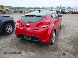 2013 Hyundai Veloster w/Gray Int z VIN KMHTC6AD8DU146035, wystawiony jako IAAI lot #41892703 z przebiegiem 241 169 mil mil oraz . Historia ofert i sprzedaży dostępna na DreamBid. Obrazek 13.