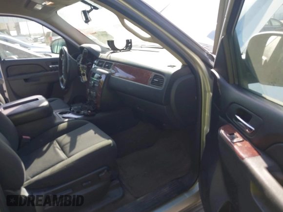 2011 Chevrolet Tahoe LS with VIN 1GNSCAE00BR140716, listed as a IAAI auction lot 40225018 with 189,052 mi miles and . Bid and sale history available at DreamBid. Image 5.