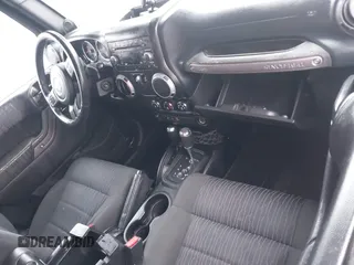 2012 Jeep Wrangler Sport z VIN 1C4AJWAG8CL262755, wystawiony jako IAAI lot #41566823 z przebiegiem 164 135 mil mil oraz . Historia ofert i sprzedaży dostępna na DreamBid. Obrazek 5.