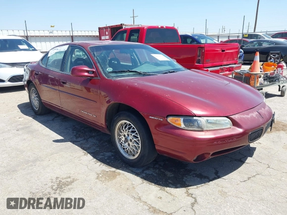 2000 Pontiac Grand Prix SE with VIN 1G2WJ52K3YF262773, listed as a IAAI auction lot 42031719 with 164,284 mi miles. Bid and sale history available at carsss.com. Image 1.